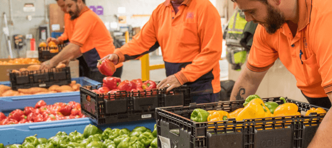 Foodbank volunteers preparing the fruits for donation